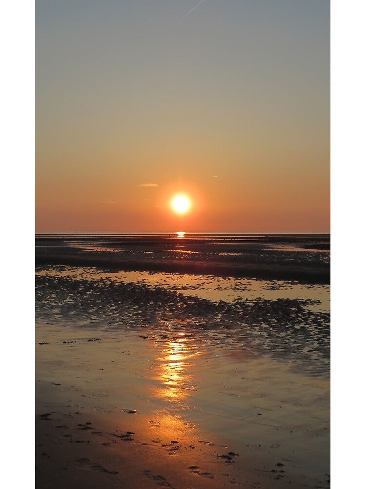 Sunset over a north wales beach by Ribster13