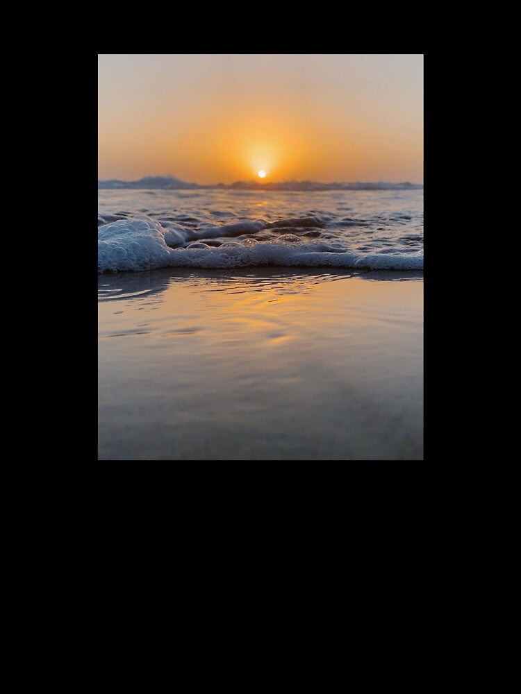 beach sunset by ocean-wave