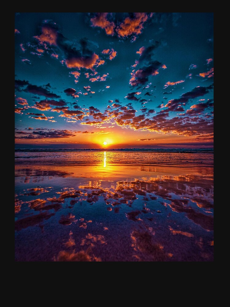 Clouds reflection at the sunset by ocean-wave